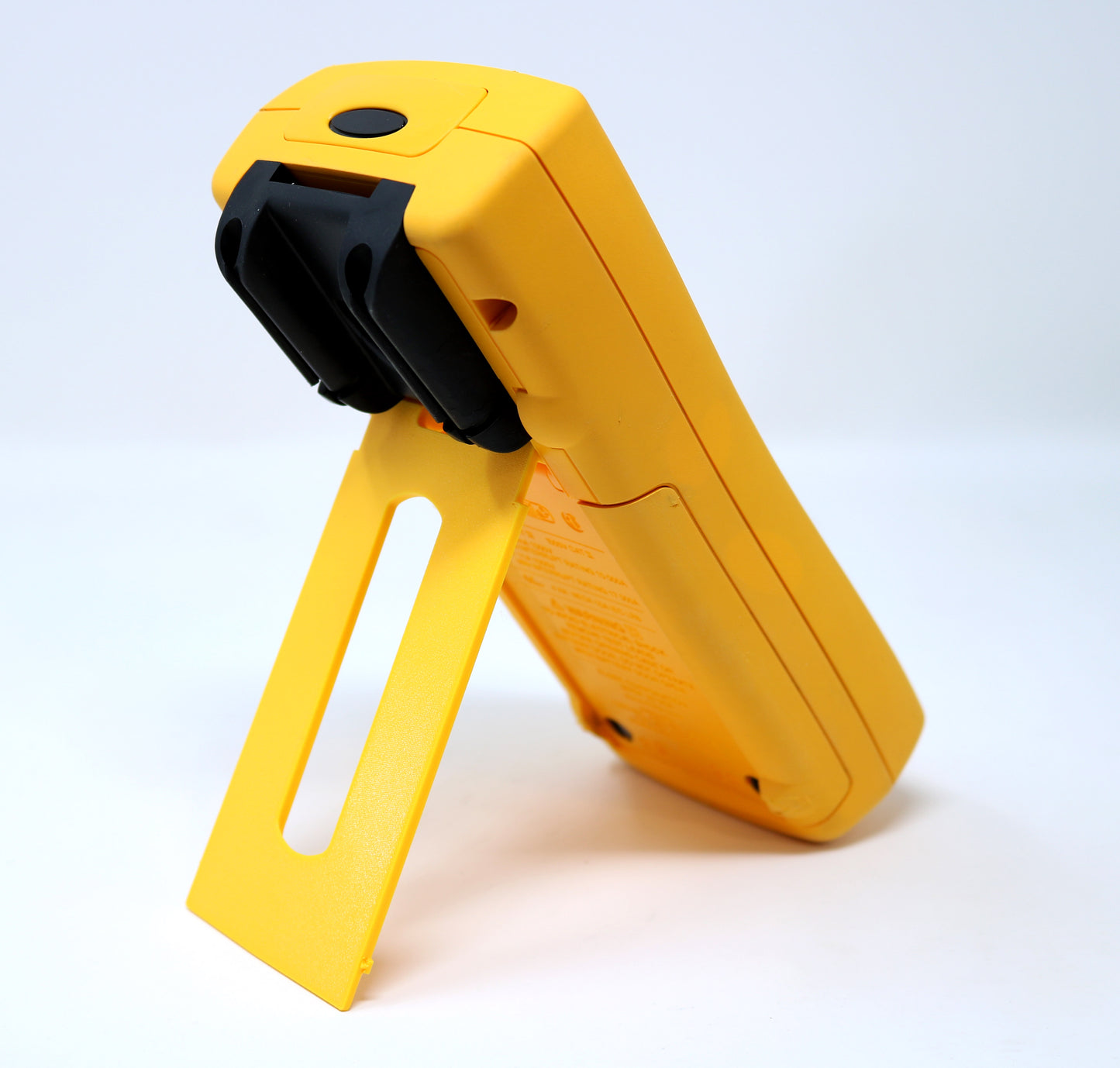 Fluke 189 handheld DMM with kick stand on a white background